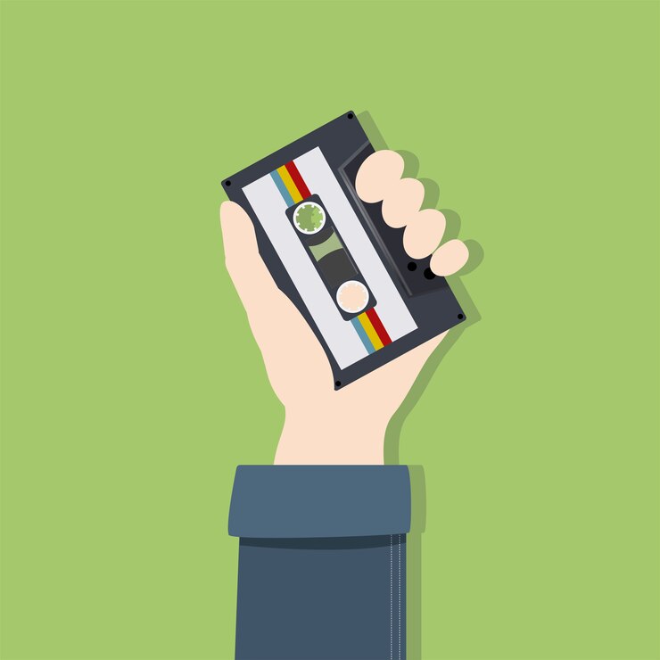 Kostenlose Vektor illustration von hand und kassette