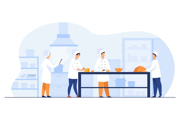Köche, Köche und Kellner arbeiten in der Restaurantküche