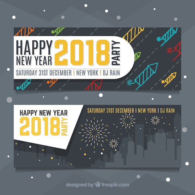Kostenloser Vektor neujahr 2018 banner mit raketen und feuerwerk