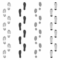 Kostenloser Vektor set mit schwarzen schmutzigen fußabdrücken