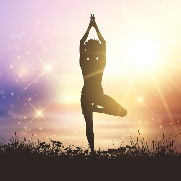 Silhouette einer Frau in einer Yoga-Pose