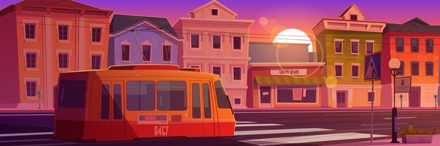 Straßenbahnfahrt auf Retro-Stadtstraße zur Sonnenuntergangszeit