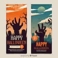 Kostenloser Vektor vintage halloween zombie hand banner