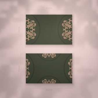 Visitenkarte in grün mit luxuriösen braunen ornamenten für ihre persönlichkeit.
