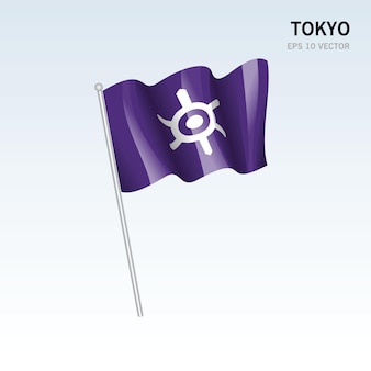 Wehende flagge der präfekturen tokio von japan isoliert auf grauem hintergrund Premium Vektoren