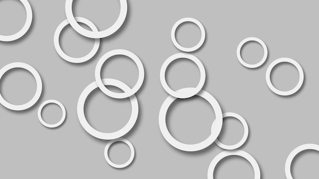 Abstrakte illustration zufällig angeordneter weißer ringe mit weichen schatten auf grauem hintergrund