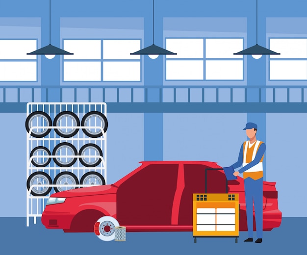 Autowerkstattlandschaft mit Autoreifengestell und Mechaniker, die an Karosserie arbeiten