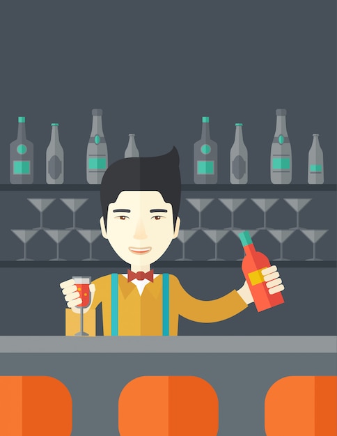 Barkeeper an der Bar hält einen Drink