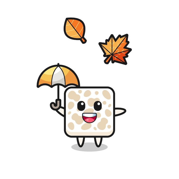 Cartoon des niedlichen Tempeh, der im Herbst einen Regenschirm hält
