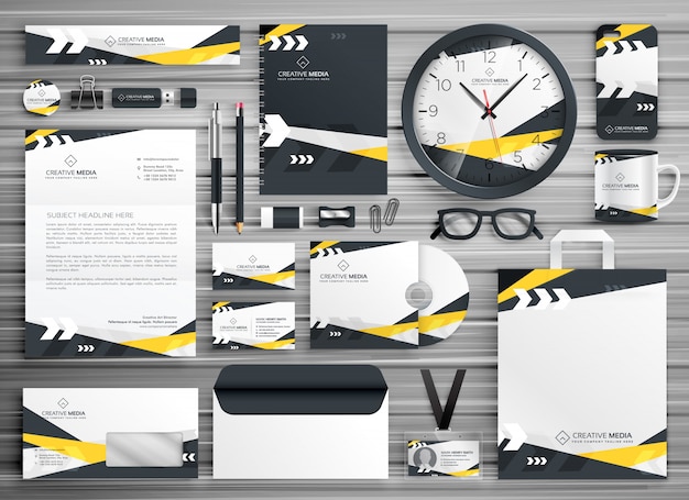 Vektor corporate identity briefpapier vorlage design mit abstrakten gelben schwarzen formen gesetzt