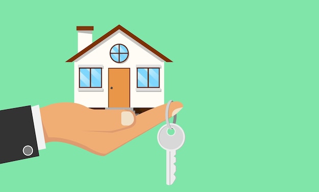 Ein Geschäftsmann hält ein Haus in der Hand und einen Hausschlüssel an der Fingerspitze