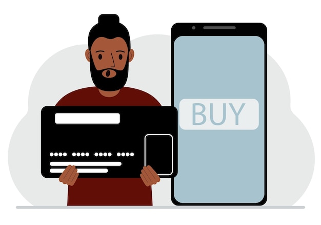 Ein mann hält eine riesige kreditkarte neben einem smartphone mit einer schaltfläche 
