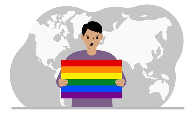 Ein mann hält vor dem hintergrund einer weltkarte eine lgbt-flagge in den händen