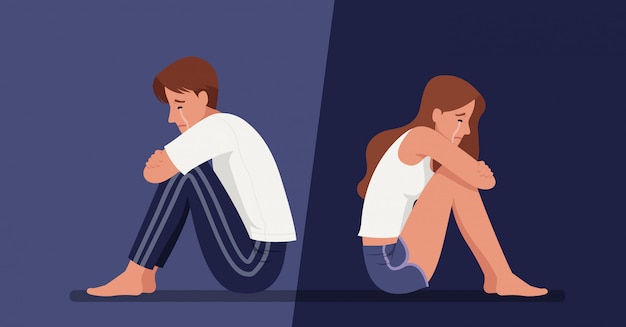 Einsamer Mann und Frau sitzen und weinen auf dem Boden und leiden unter Depressionen oder Beziehungszusammenbruch.