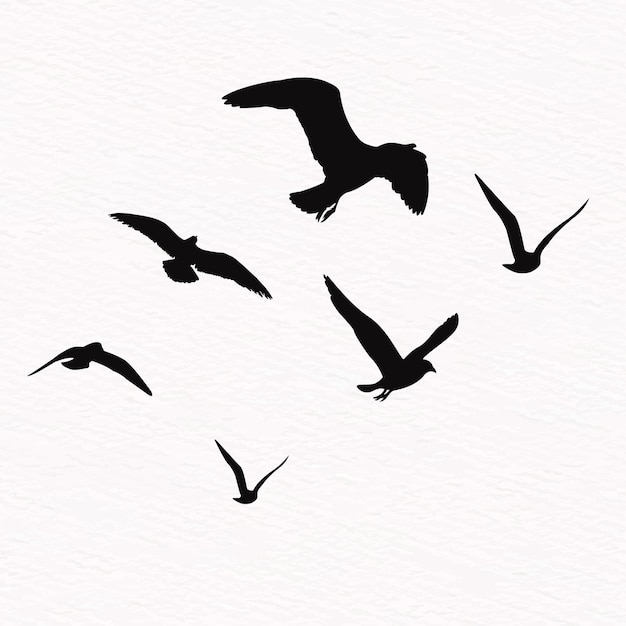 Flock fliegender Vögel in einer Reihe von Vektor-Silhouetten