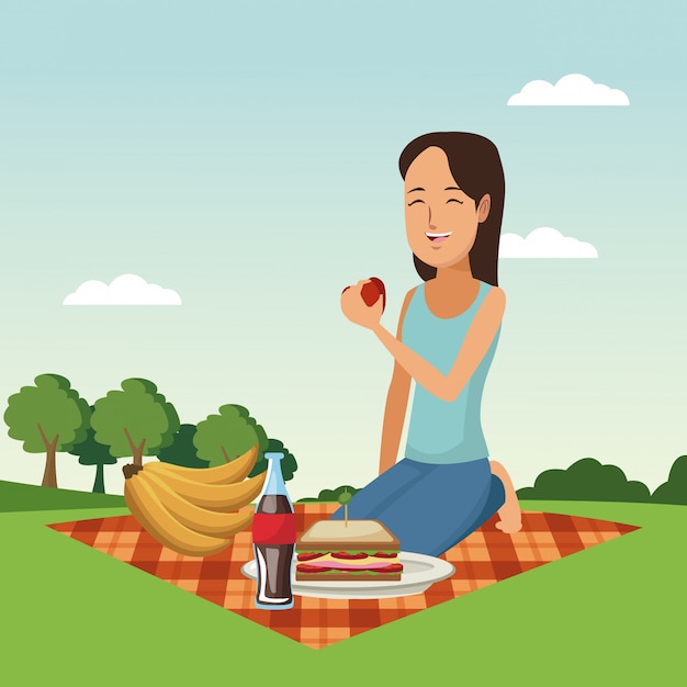 Frau am picknick im park