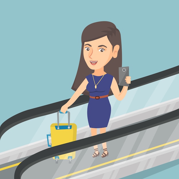 Frau, die smartphone auf rolltreppe am flughafen verwendet