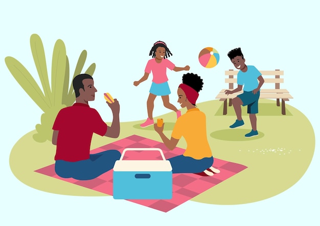 Glückliche schwarze familie beim picknick