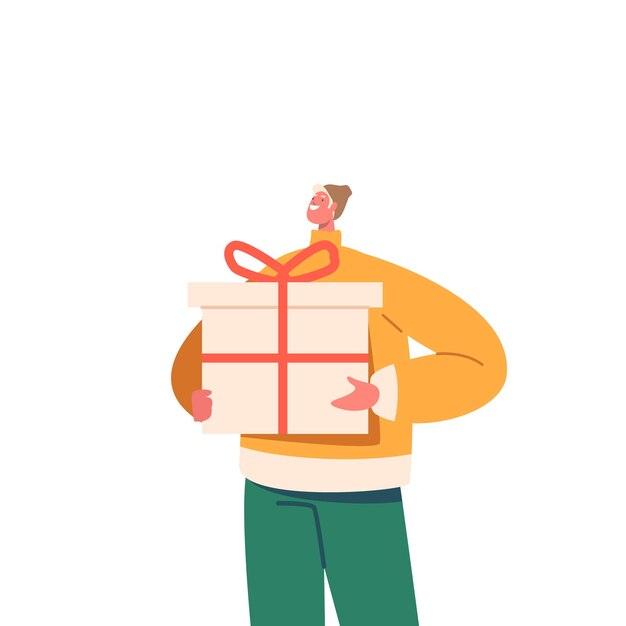 Glücklicher junger Mann in der warmen Kleidung, die große Geschenkbox hält, die mit festlichem Bogen lokalisiert auf weißem Hintergrund eingewickelt wird