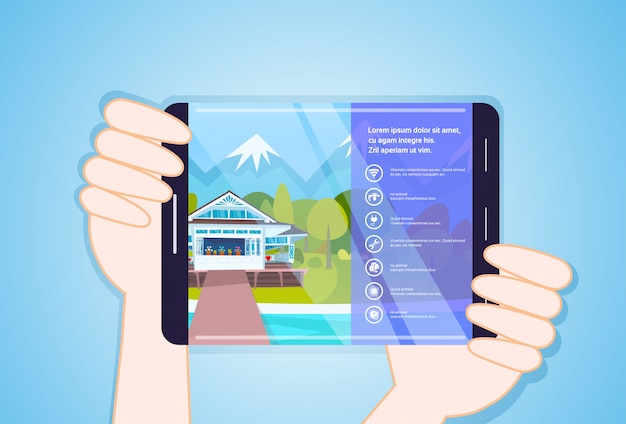 Hände, die tablette mit wohnungs-app halten