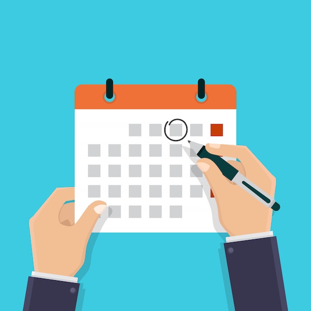 Hand hält einen Kalender