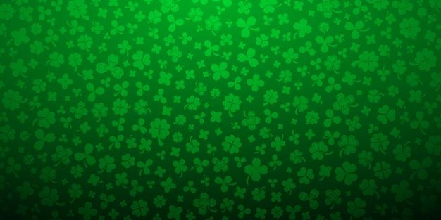 Hintergrund am St. Patrick's Day aus Kleeblättern in grünen Farben