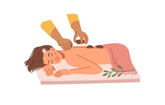 Hot-Stone-Massage im Spa-Salon mit Kieselsteinen auf dem Rücken