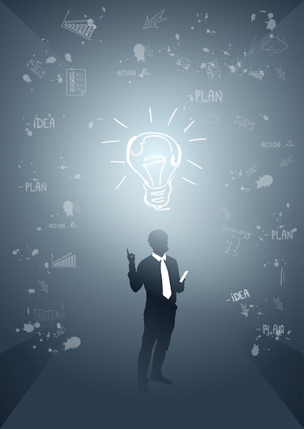 Ideen-Innovations-Konzept des Geschäftsmann-Schattenbild-Glühlampe-neuen
