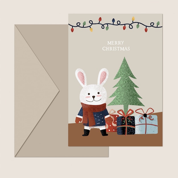 Vektor kaninchen mit geschenken weihnachtskarte
