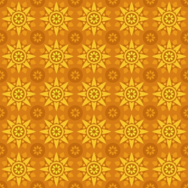 Klassischer nahtloser batikmusterhintergrund. luxus geometrische mandala tapete. elegantes traditionelles blumenmotiv in orange-gelber farbe