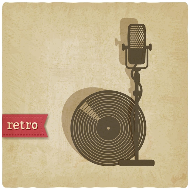 Mikrofon und Vinylplatte auf Vintage-Hintergrund