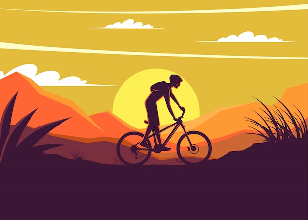 Mountainbike silhoeutte mit sonnenuntergang hintergrund