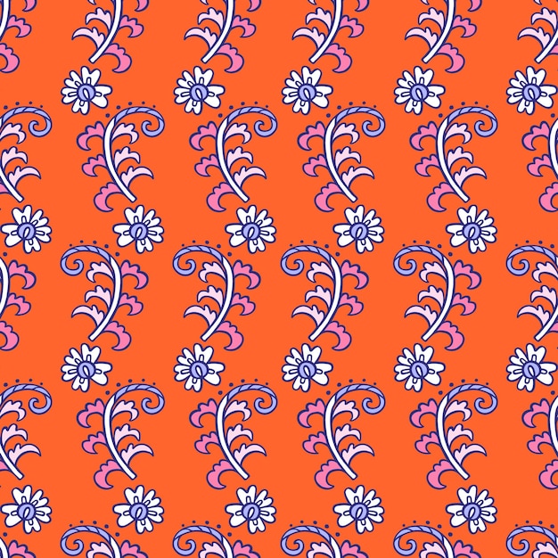 Nahtloses blumenmuster auf orangefarbenem hintergrund paisley-motive