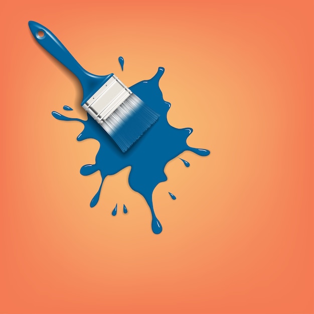 Pinsel mit blauem Farbspritzer an der orangefarbenen Wand