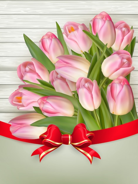 Rosa Tulpen über weißem Holz mit Schleife