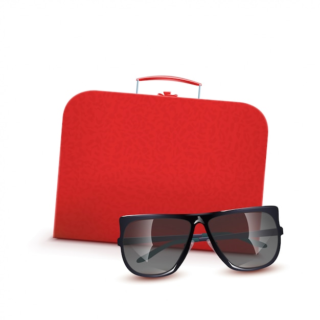 Roter Koffer mit Sonnenbrille