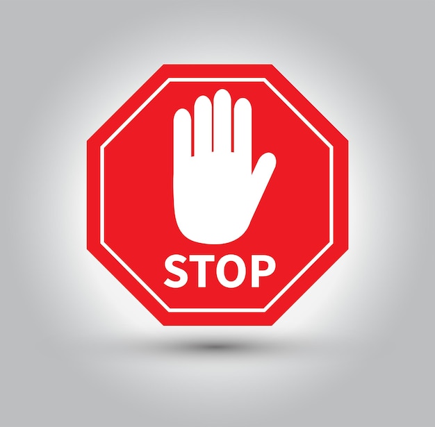 Rotes Stoppschild auf grauem Hintergrund isoliert