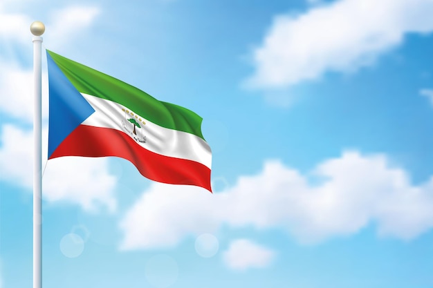 Schwenkende flagge äquatorialguineas auf himmelshintergrund vorlage für plakatgestaltung zum unabhängigkeitstag