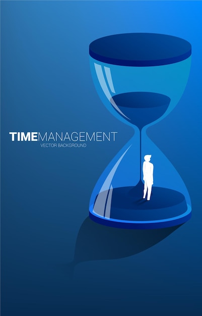 Silhouette eines Geschäftsmannes, der mit Sanduhr-Konzept für Büroangestellte und Arbeitszeit steht