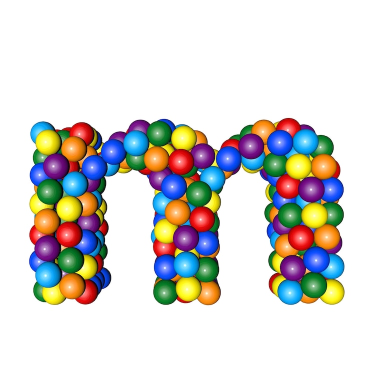 Vektor symbol aus kugeln in regenbogenfarben buchstabe m