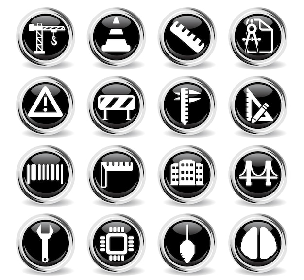 Technische symbole auf runden schwarzen knöpfen mit metallring
