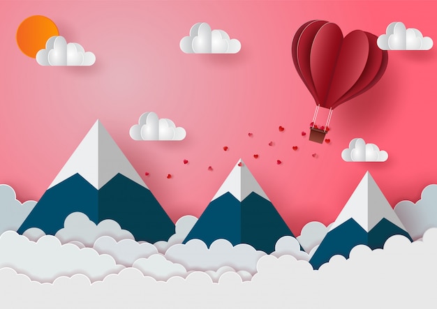 Valentinstag mit luftballons schweben über den bergen