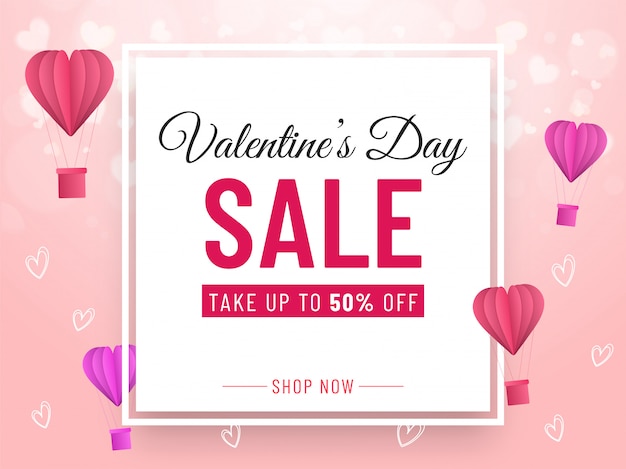 Valentinstag-verkaufs-fahnen-design mit 50% rabatt-angebot, papierschnitt-heißluftballonen und herzen verziert auf rosa hintergrund.