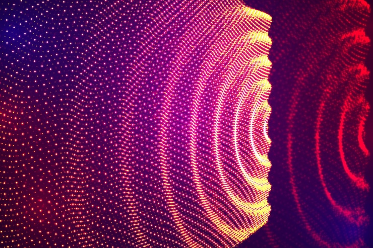 Vektor vektor 3d-hintergrundwelle von punkten geometrischer tanz