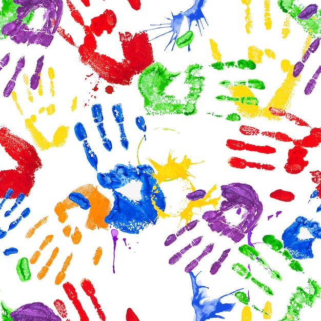 Vektor vektornahtloses muster mit hellen, mehrfarbigen handabdrücken für kinder, die digitales papier scrapbooking