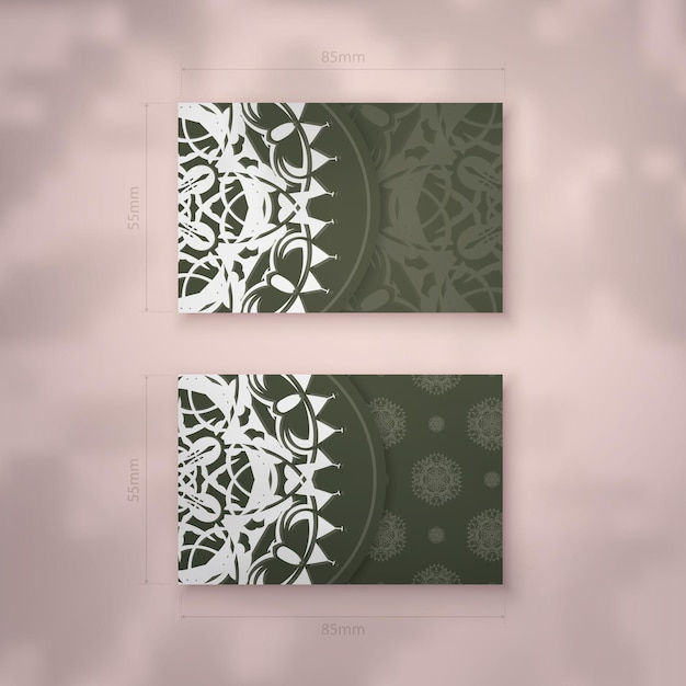 Vorzeigbare visitenkarte in dunkelgrüner farbe mit luxuriösen weißen ornamenten für ihre persönlichkeit.