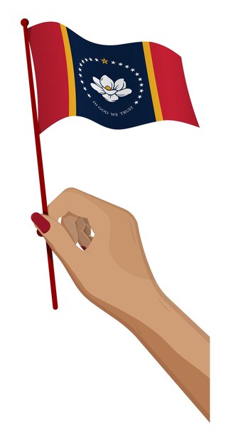 Weibliche hand hält sanft die kleine flagge des amerikanischen bundesstaates mississippi fest.