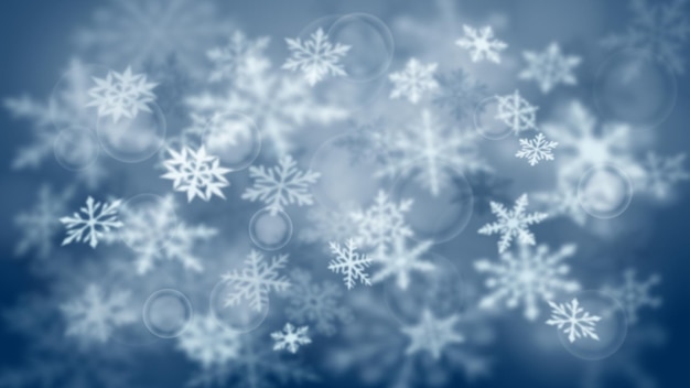 Weihnachten unscharfer Hintergrund von komplexen defokussierten großen und kleinen fallenden Schneeflocken in blauen Farben mit Bokeh-Effekt