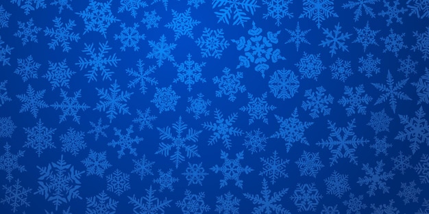 Weihnachtshintergrund mit verschiedenen komplexen großen und kleinen schneeflocken in blauen farben