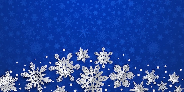 Weihnachtshintergrund mit volumenpapierschneeflocken mit weichen schatten auf blauem hintergrund